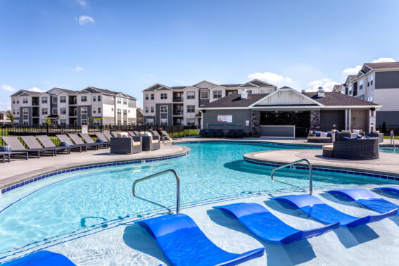 Blue lounge chairs by the pool