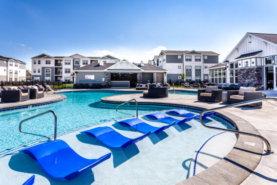 Blue lounge chairs by the pool