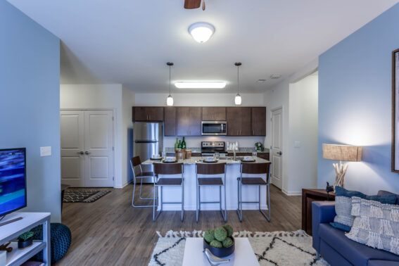 Apartment kitchen featuring an open floor plan